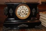 Unique Antique chiming clock with buffalo head detailing