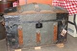 1800's Trunk with hammered tin and wood detailing. Has interior shelf