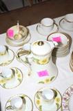 Antique hand painted coffee set with matching cups and saucers