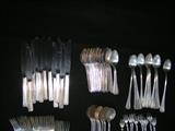 W. M. A. Rogers hotel plate by Oneida ltd., stainless knife blades, shrimp forks, teaspoons, soup spoons, forks, tea spoons. Case is origional drift lodge wood from outside Zion Nationl forest