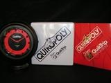 QT clock and Quikopoly game, 50 year commemorative items 1958 - 2008, new in box