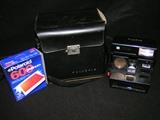 Polaroid Auto Focus 660 land camera with manual and bag