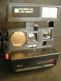 Polaroid Auto Focus 660 land camera with manual and bag