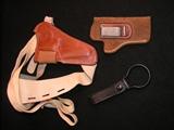 Gun holster; S and W Bianch and baton holder