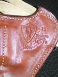 Gun holster; S and W Bianch and baton holder