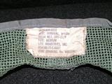 Helicopter flak jacket, USN gas mask, flight helmet, goggles and cover, pictures and news paper info