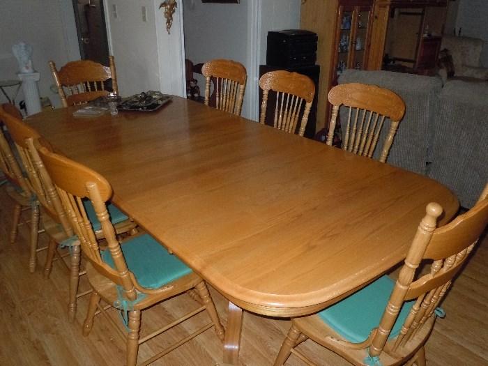 Oak table over 8 ft long and 8 chairs