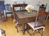 antique barley twist table and 6 chairs has 6 leaves