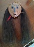 Clay, horse hair and feathers mask