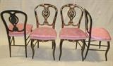 Set of European continental black lacquer chairs