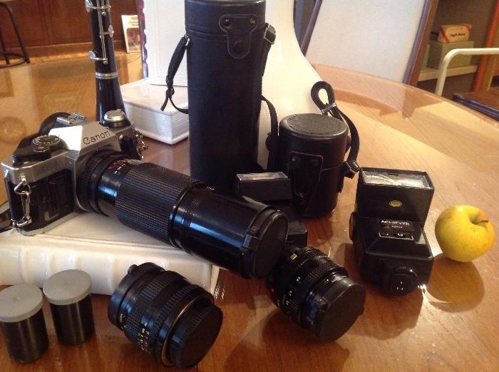 Canon 35mm with several lenses including this telephoto