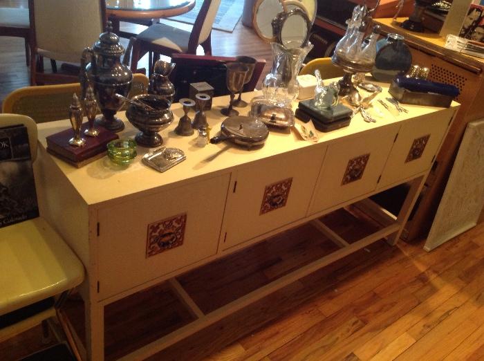 This fun buffet is so usable. We filled it with lots of vintage "silver" 