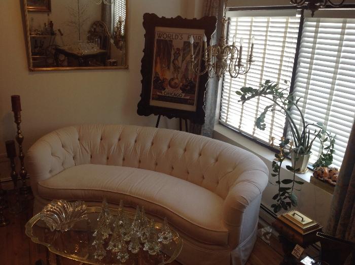 Not everyone can pull off a white sofa.... But for those who can -  this one is classic. 