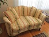 Lovely antique loveseat, finely reupholstered