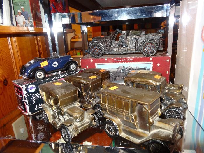 vintage toy cars or possibly piggy banks
