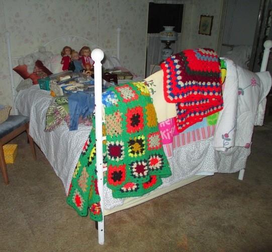 Double size bed with air mattress, hand made quilts an comforters