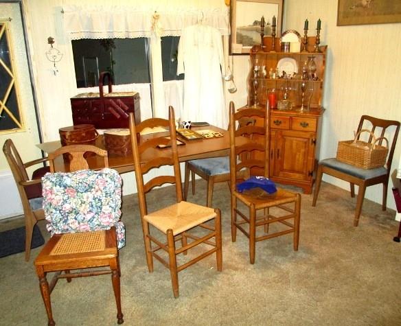 Teak dinning room table and furniture w/six matching chairs, 5 other antique chairs,sewing boxes, candle sticks, sconces, etc..