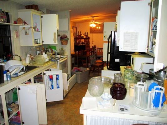 All kitchen wares, a new juicer, microwave oven, some unopened spices, olive oil, supplies, cookware, etc.. all must go