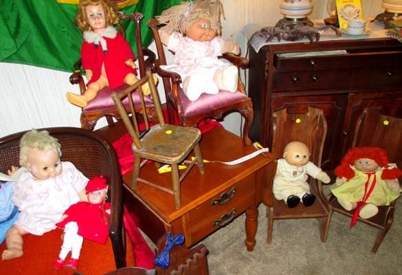 Doll miniature furniture with collection of interesting vintage dolls..