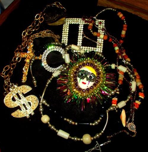 Costume jewelry and belt buckles