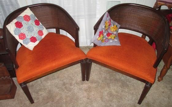 A pair of wicker back chairs