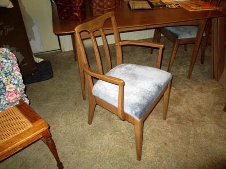 One of five dinning room chairs that come with the mahogany dining table