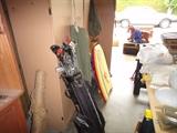 Golf clubs, boogie board