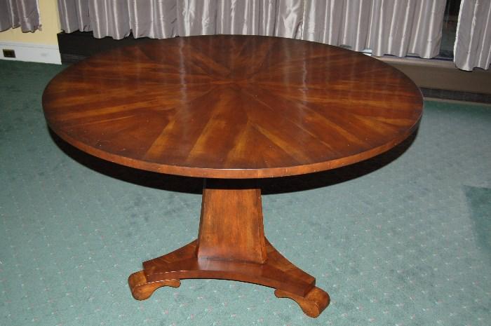 Lot #93  One of Two Contemporary Mahogany Round Tables with Starburst Centers