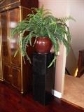 BLACK MARBLE PEDESTAL WITH SILK FERN IN CERAMIC PLANTER.
