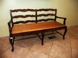 CARVED BENCH WITH WICKER SEAT