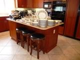 3 CARVED COUNTER STOOLS WITH BLACK LEATHER SEATS/NAILHEAD DETAIL