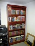 COLLECTION OF VHS TAPES AND DVDS. OAK BOOKCASE FOR SALE