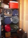 SLEEPING BAGS, COOLERS, AND LUGGAGE FOR SALE. PVC SHELVING ALSO FOR SALE.