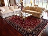 2 BAKER SOFAS WITH BAKER MASTERCRAFT BRASS/GLASS COFFEE TABLE & 9' X 12' HAND KNOTTED ORIENTAL RUG.