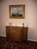 ROBERT SANDERS PAINTING OF SHIP ABOVE CREDENZA WITH WICKER DOORS