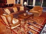 SOFA AND MATCHING ARMCHAIR BY ART VAN WITH 6' X 9' MACHINE MADE ORIENTAL RUG.