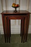 Mahogany nesting tables, stone fruit