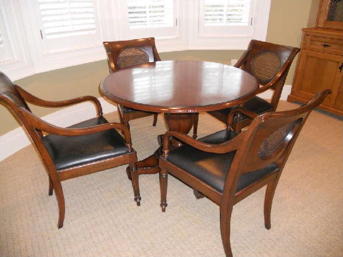 Round game table with chairs