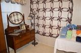 Oval mirror dresser, wedding ring quilt