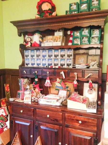 many brand new Hallmark items, beautiful large cabinet