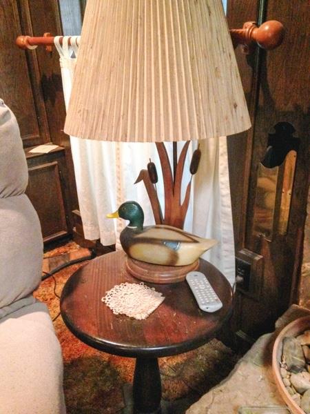 duck lamp on wood side table