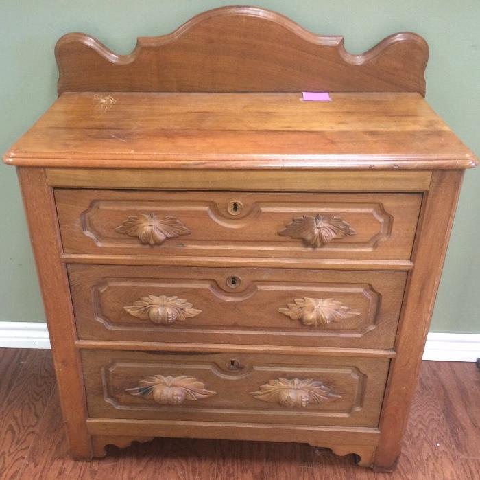 Nice antique chest with carved handles.