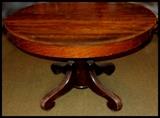 round oak table with five leaves
