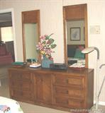 Bassett Queen Bedroom Set.
This set consists of: Bed, 2 Night stands, Tall boy dress & Dresser with 2 mirrors.
Headboard measures 44 inches Tall, Night stands measure 26 inches long by 15 inches deep X 22 inches tall – each has two drawers. Tall boy dresser with 5 drawers – measures 38 inches long by 18 inches deep by 45 ½ inches tall. Dresser with mirrors has 6 drawers and 3 additional drawers in the middle section. This measures 70 inches long by 18 inches deep by 30 inches tall. This is being sold for local pickup in Coral Springs, FL. Please call 561-306-1291 or 561-470-5141 for directions.