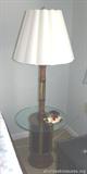 Floor Lamp with glass table top
This measures 54 inches tall, and is in good condition. (MC23).