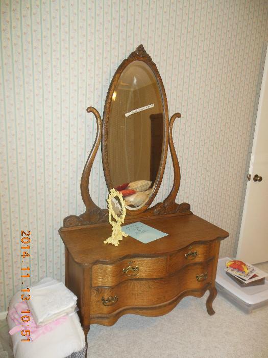 2 drawer vanity with oval mirror. Beautiful