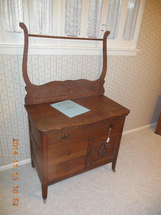 Antique wash stand with towel rack
