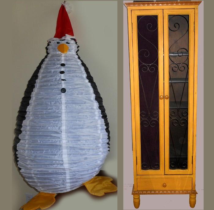 Large Christmas Penguin and Tall Yellow Cabinet