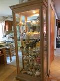 Oak lighted tempered glass curio , collectible tea pots and collectible schnauzers