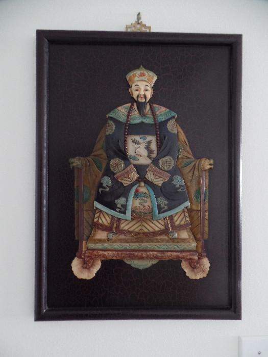 Two complimentary Asian wall hangings